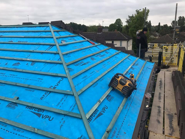 Re Tiling Roofs 1