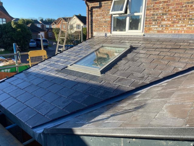 Slate roofing with sky light in Baldock