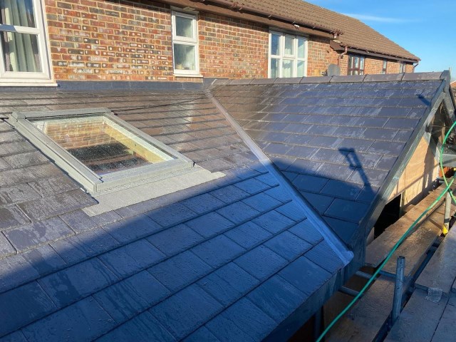 Slate roof with skylight in Baldock