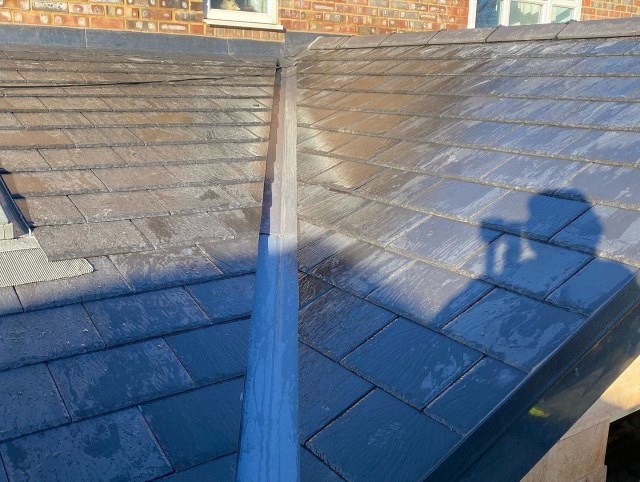 Slate roofing with sky light in Baldock